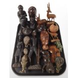 A group of African carved hardwood busts and other figures.