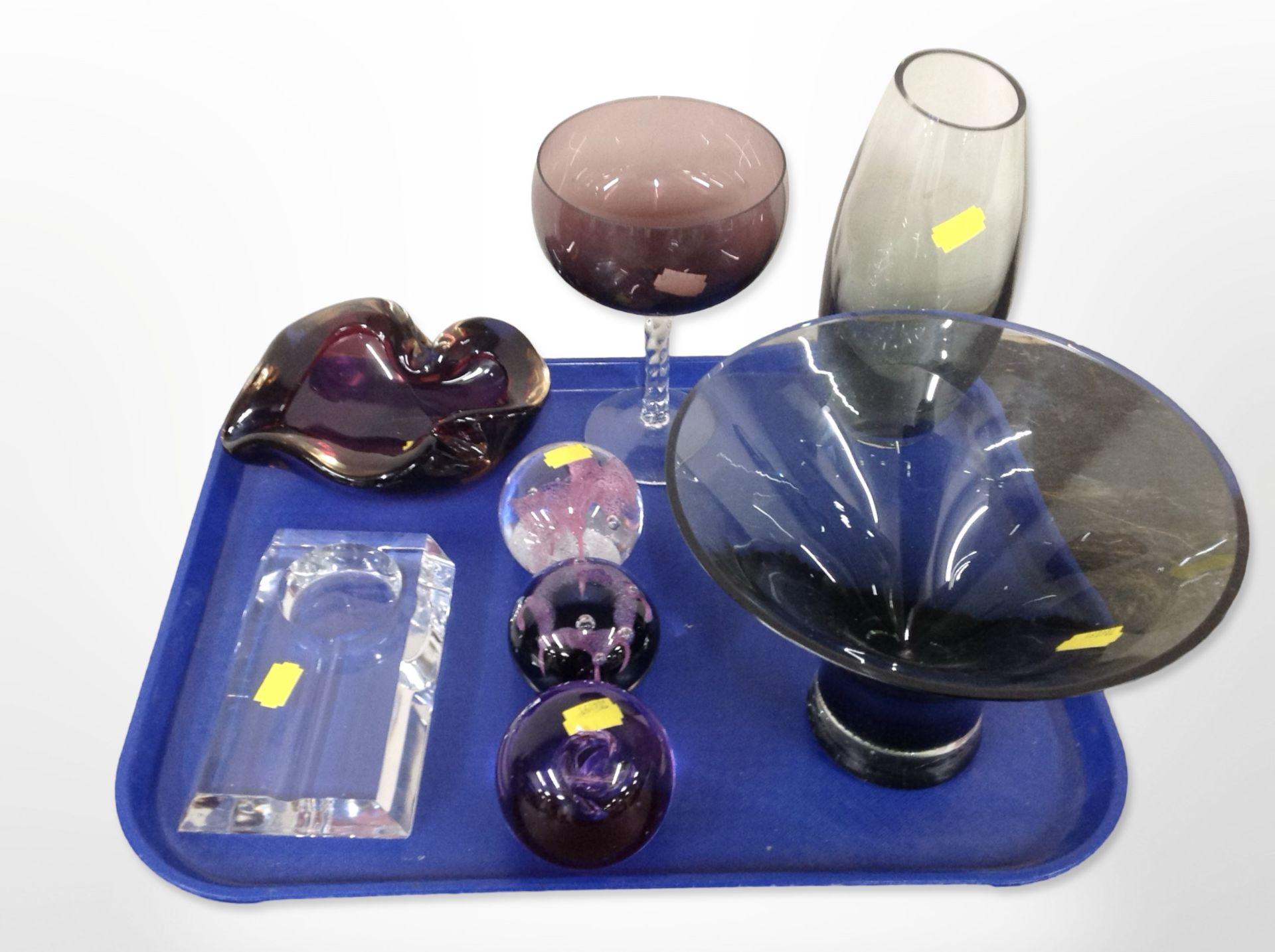 A group of glass paperweights, vase, oversized goblet, Scottish glass bowl, etc.