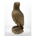A carved wooden figure of an eagle, height 27 cm.