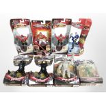 Eight Bandai Power Rangers figurines, boxed.