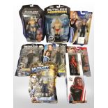 Eight Mattel and other Wrestling figurines, boxed.