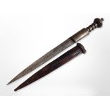 An African dagger with metal hilt in leather sheath, blade 24.5cm.