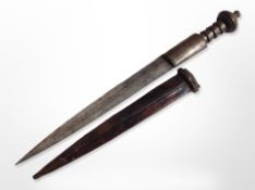 An African dagger with metal hilt in leather sheath, blade 24.5cm.