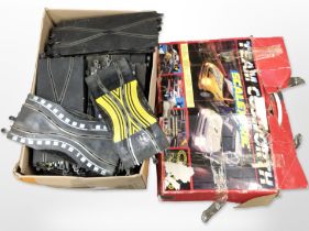 A Scalextric racing set (packaging as found) and a further box containing a large quantity of track.