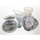 A group of crystal vases and fruit bowls.