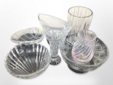 A group of crystal vases and fruit bowls.