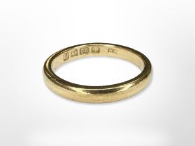 A 22ct yellow gold band ring, size L. CONDITION REPORT: 4.