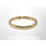 An 18ct gold band ring, size P CONDITION REPORT: 2.