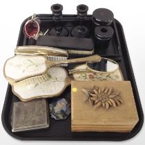 A group of dressing table items, turned ebony tray, candlesticks and pots,