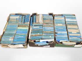 A large collection of Pelican books.