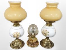 A pair of table lamps in the form of oil lamps,