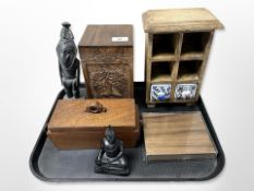 A collection of wooden items including tea caddy, carved figure, tribal style figure,