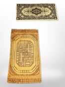 A machine-made Persian style rug, 118 cm x 60 cm,