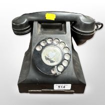 A black Bakelite GPO telephone.