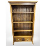 A contemporary hardwood open bookcase,