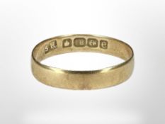 An 18ct yellow gold band ring, size J. CONDITION REPORT: 1.1g.