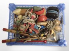 A group of vintage toys including skipping ropes, spinning tops,