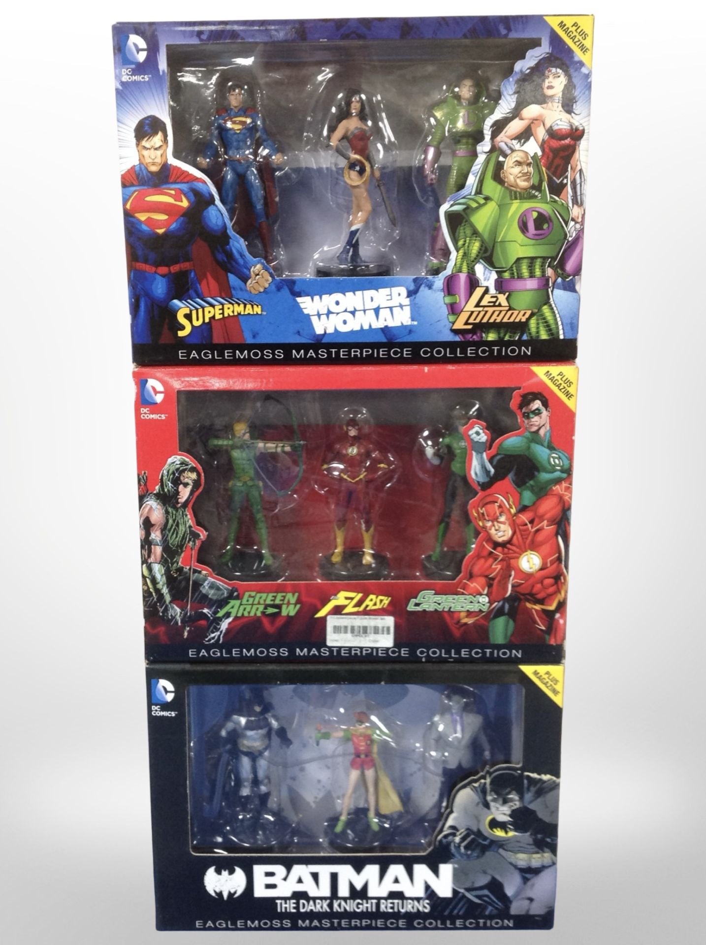 Three DC Comics Eaglemoss Masterpiece Collection figurine sets, boxed.