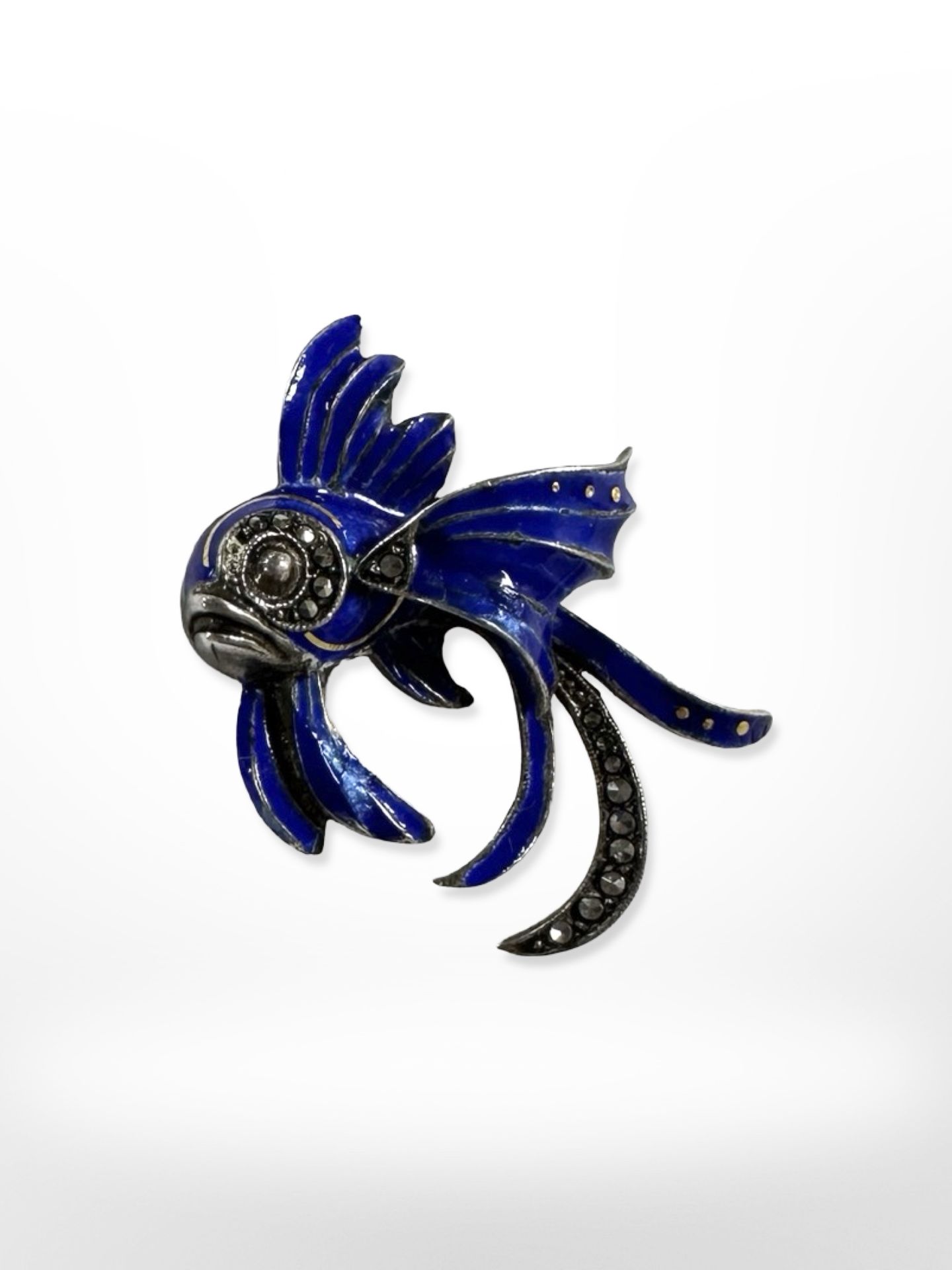 A Sterling silver blue enamel and marcasite brooch modelled as a tropical fish, width 35 mm.