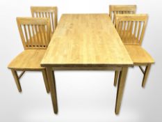 A contemporary pine kitchen table,