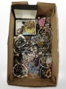 A box of mixed costume jewellery, bangles, bracelets, necklaces, etc.