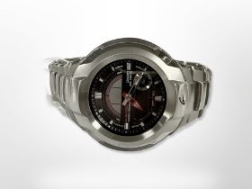 A Casio G-Shock stainless steel Gent's wristwatch with tin