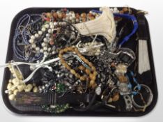 A group of costume beads and necklaces, ladies' and gents' wristwatches, hand fans, etc.