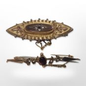 A 19th-century 9ct gold oval memorial brooch, and a further garnet and seed pearl brooch.