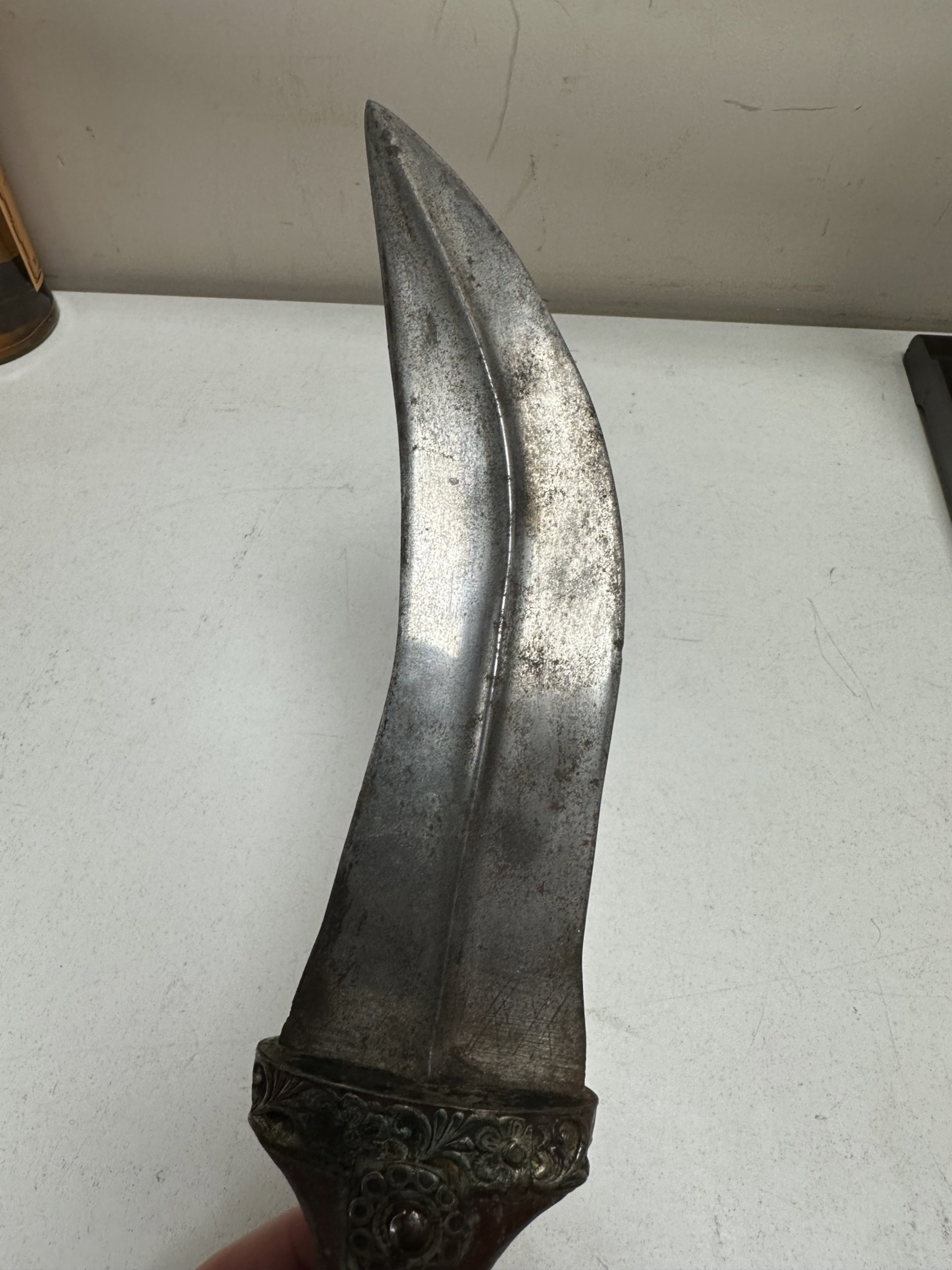 Two Kukri knives in sheathes, and an antique Arab Jambiya knife, - Image 4 of 10