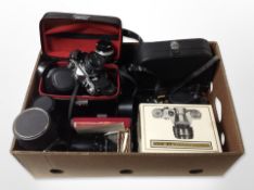 A group of cameras including Pentax ME Zenith Reflex camera, various lenses,