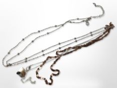 A flat link silver gilt necklace, a further long chain necklace,
