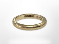 A 9ct gold band ring, size P CONDITION REPORT: 4.