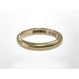 A 9ct gold band ring, size P CONDITION REPORT: 4.