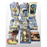 A group of nine Mattel, Funko and other figures including Max Steel, Ben 10, etc.