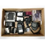 A group of digital cameras including Fujifilm S1730, Canon, Nikon, etc., Garmin Sat-Nav, etc.