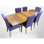A set of six Ikea dining chairs in purple upholstery