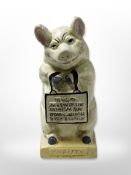 A vintage hand painted cast iron Hubley 'Thrifty' piggy bank, height 16 cm.