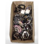A tray of assorted costume necklaces, bangles, bracelets, etc.