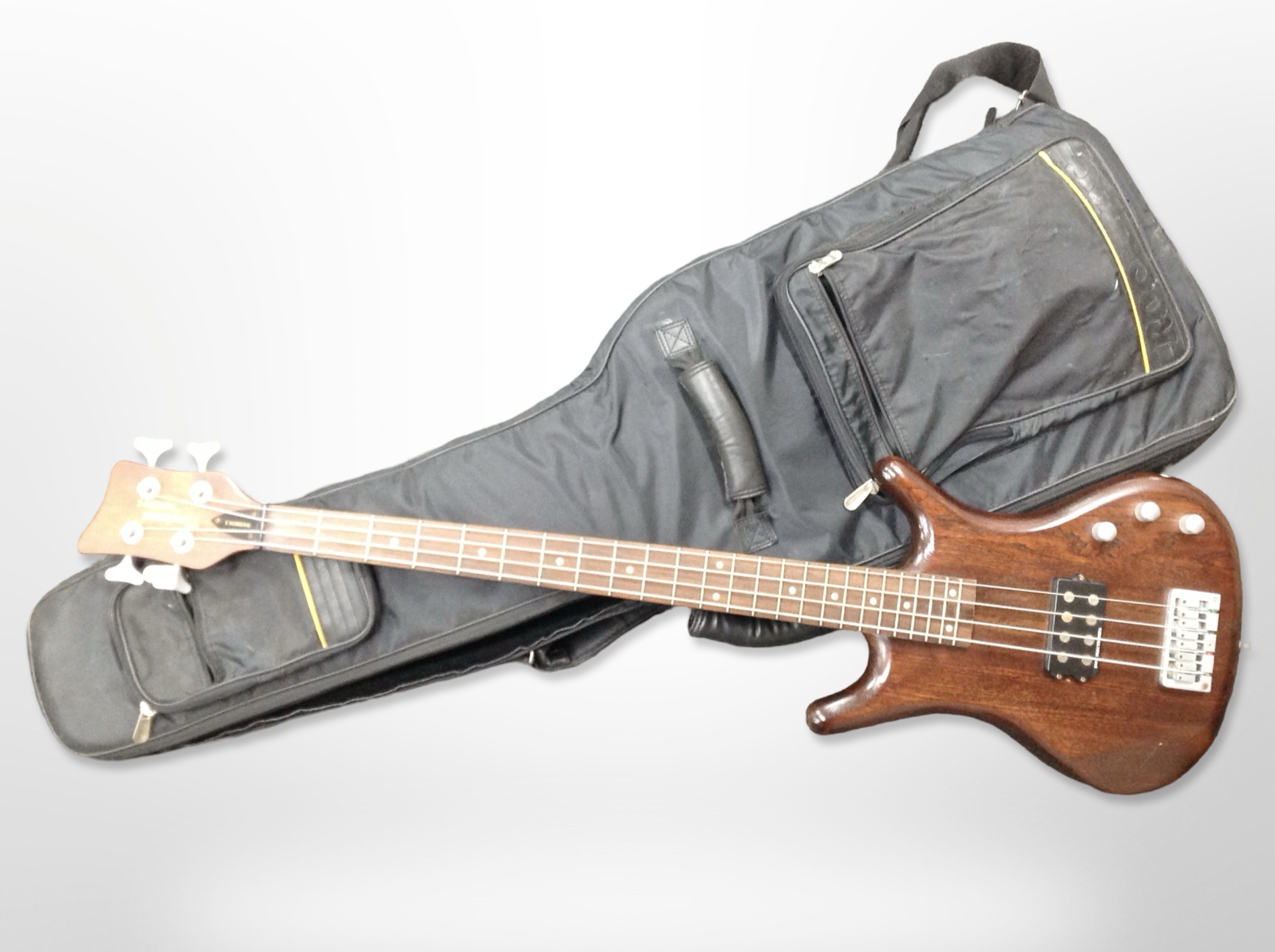 A Tanglewood Warrior II bass guitar with soft carry bag.