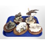 Four Border Fine Arts animal figures, and a further Franklin Mint figure of two seals,