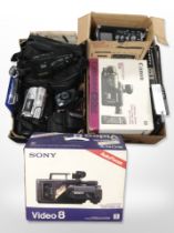 A group of video cameras including Canon, Sony, etc.