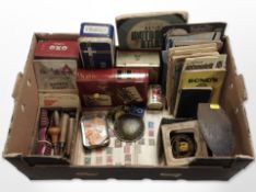 A group of vintage tins including OXO, pastry cutter and other items, stamp book, ephemera,