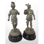 A pair of late-19th century French spelter figures of soldiers on turned plinths, height 34cm.