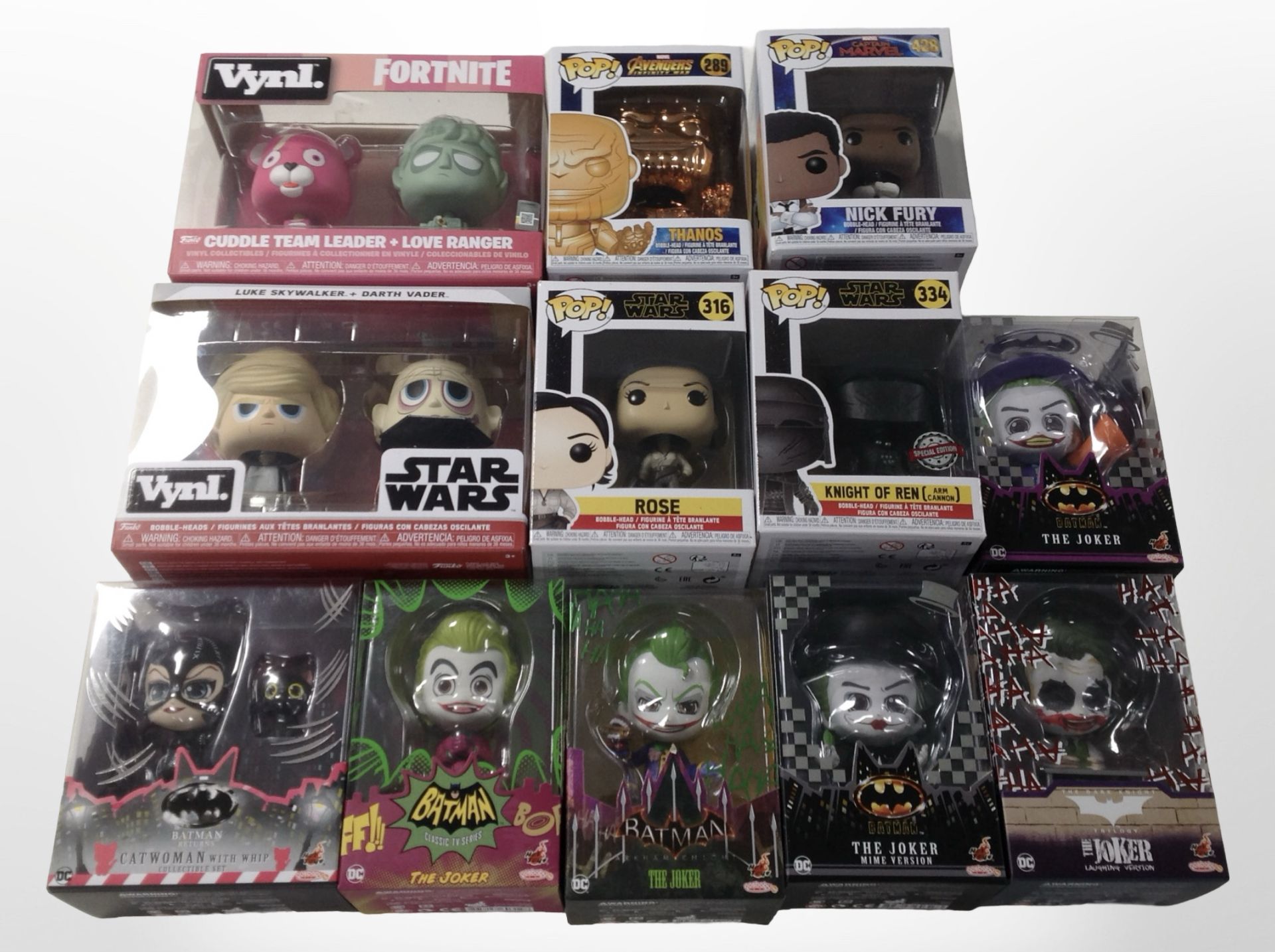 12 Funko and Hot Toys figurines including Marvel, Star Wars, Fortnite, etc., boxed.