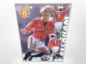A David Beckham signed poster, 70cm x 50cm.