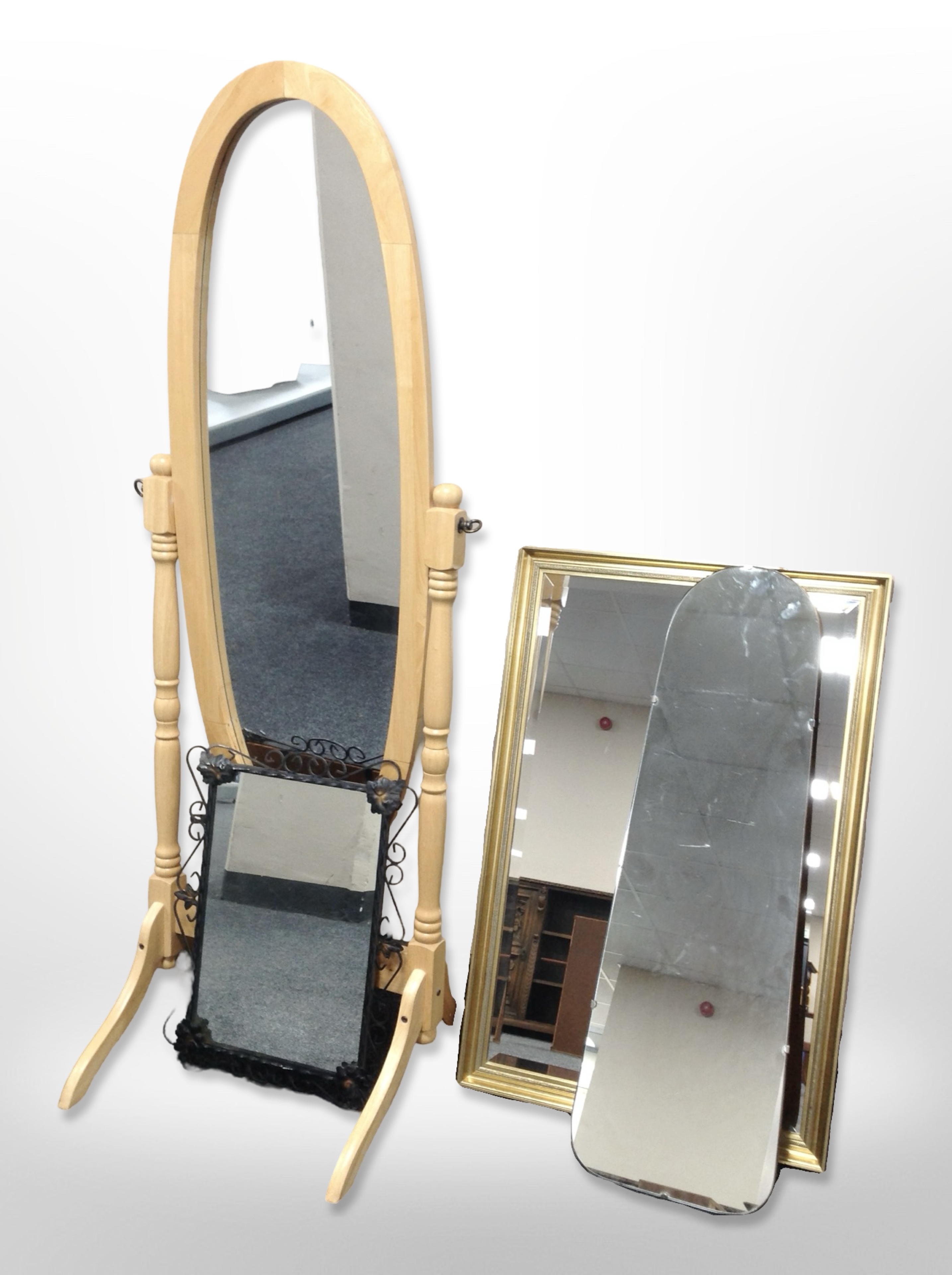 A contemporary pine cheval mirror and two further mirrors.