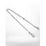 A 9ct white gold necklace with pearl pendant