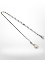 A 9ct white gold necklace with pearl pendant