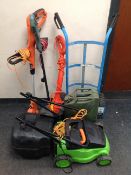 An electric garden mower, two strimmers,