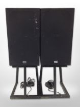 A pair of Rotel speakers on metal stands, height 75cm.